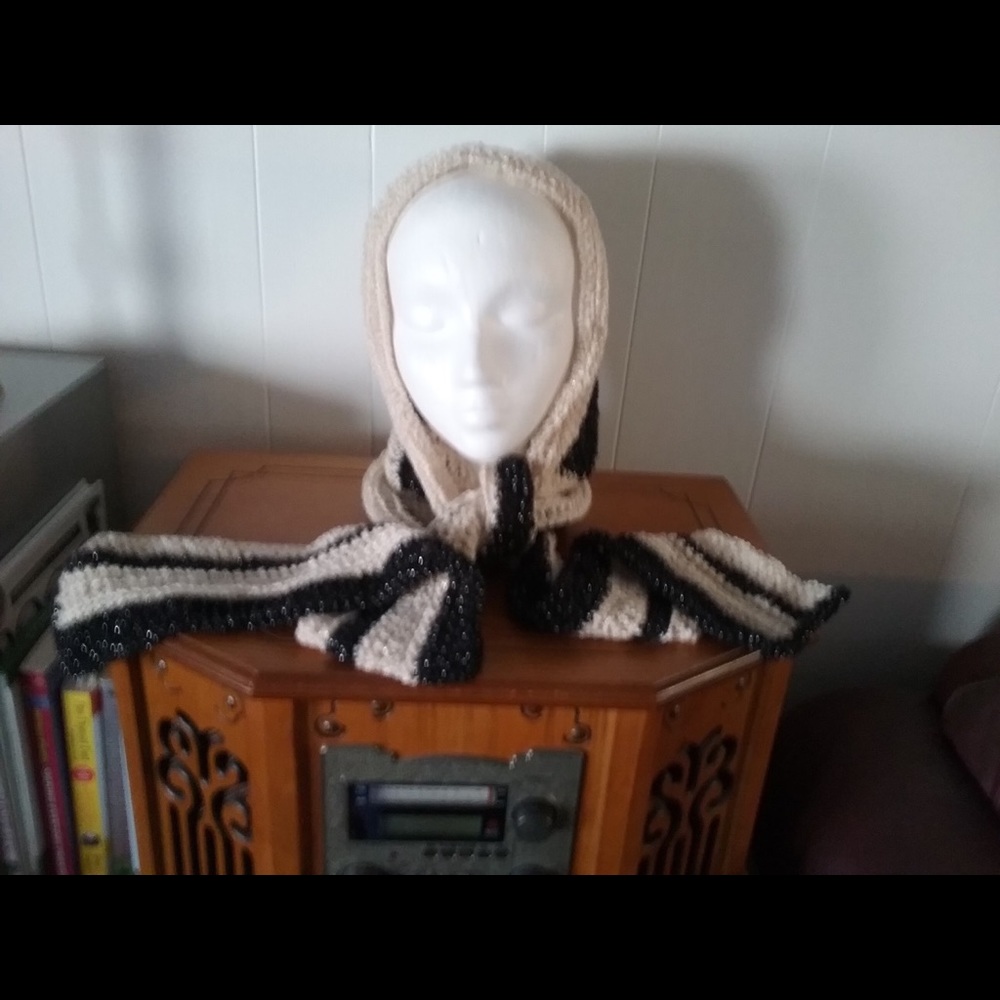 Hood with attached scarf